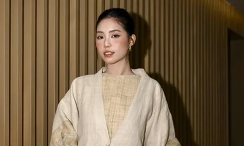 Thiếu úy là Á hậu Việt Nam gây chú ý khi vừa chơi đàn vừa làm người mẫu