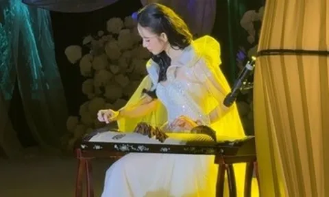 Người mẫu Hương Liên chơi đàn, được chồng CEO hơn 12 tuổi bế bổng trong đám cưới