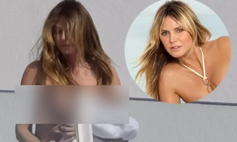 Siêu mẫu Heidi Klum gây tranh cãi khi bán nude tắm nắng ở ban công
