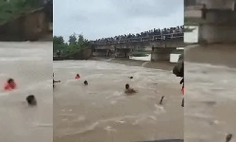 CLIP: Hàng trăm người tìm kiếm nạn nhân bị nước cuốn mất tích ở Nghệ An